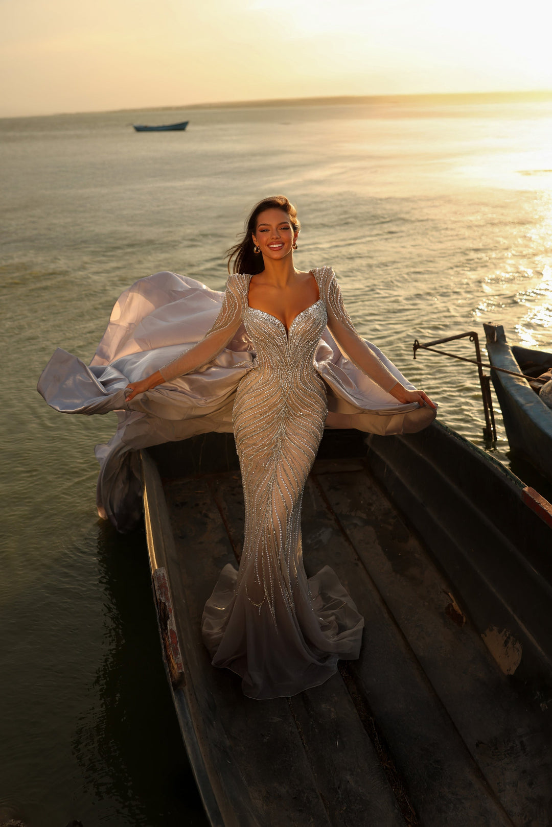 Delilah LD11475 Plunging Illusion Long Sleeve Beaded Corset Sheath Gown with Overskirt - Grey front view