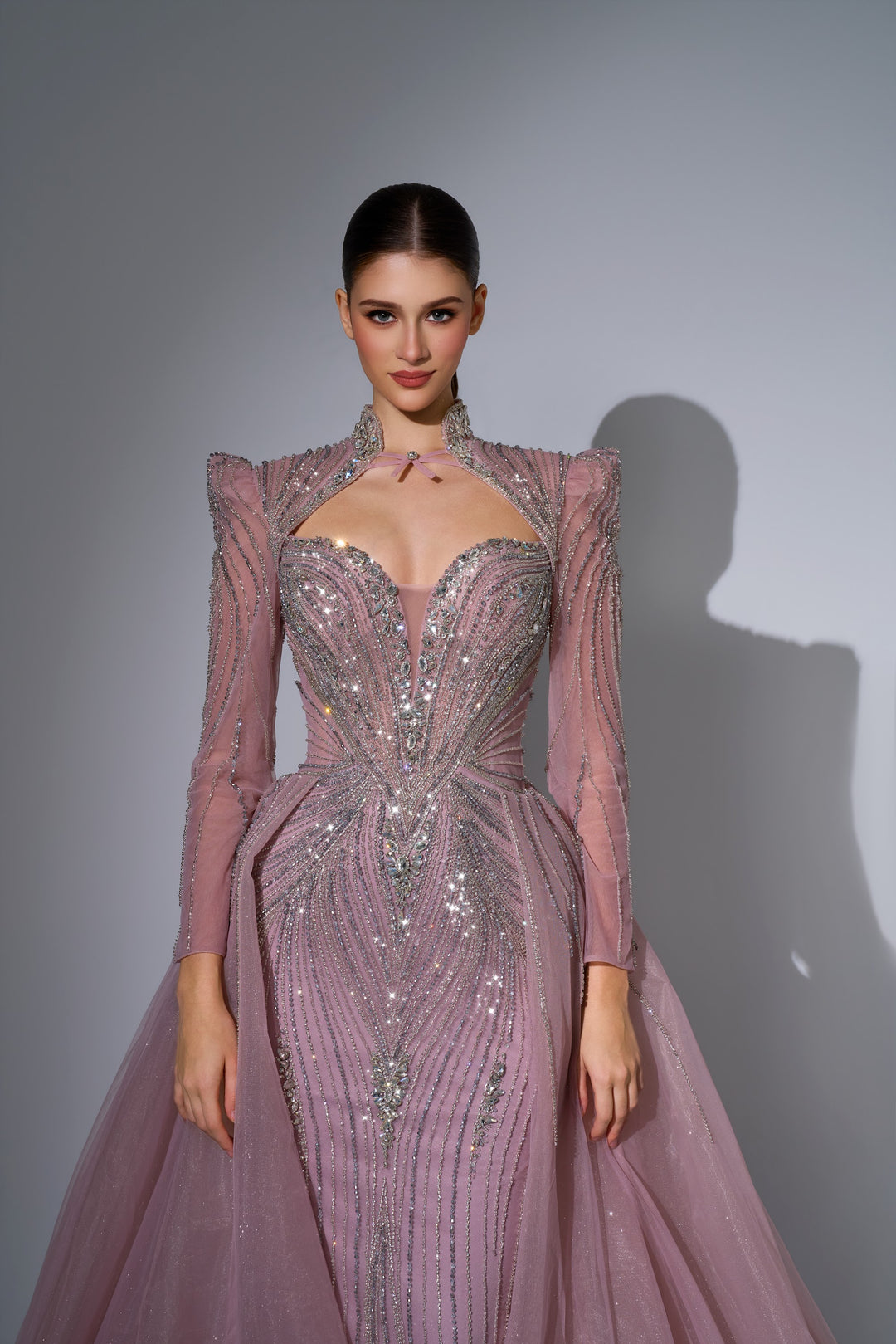 Delilah LD11650 High Collar Long Sleeve Crystal Sheath Gown with Tulle Overskirt - Pink close-up view