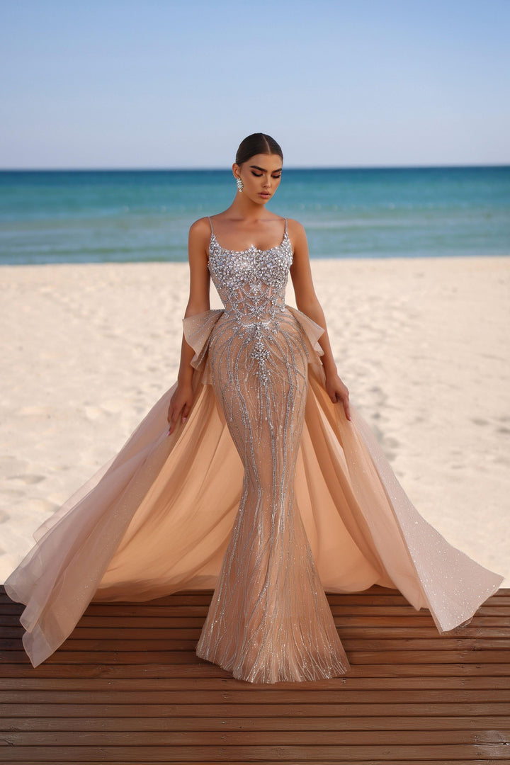 Delilah HM328 Spaghetti Strap Beaded Mermaid Gown with Ruffled Hip Overskirt - Champagne front view