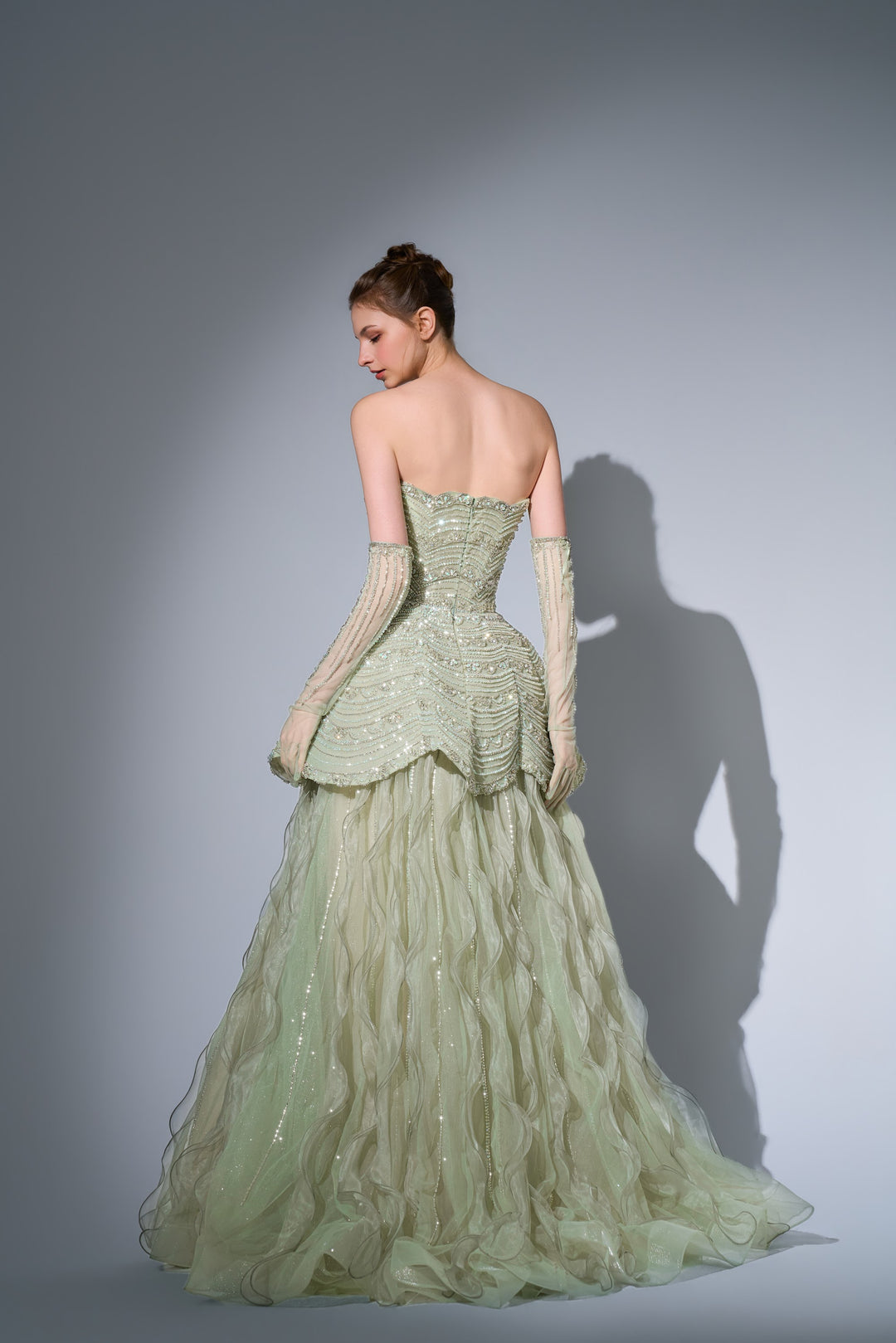 Delilah SH12091 Strapless Beaded Tiered Peplum Ball Gown with Ruffled Tulle Skirt - Mint back view