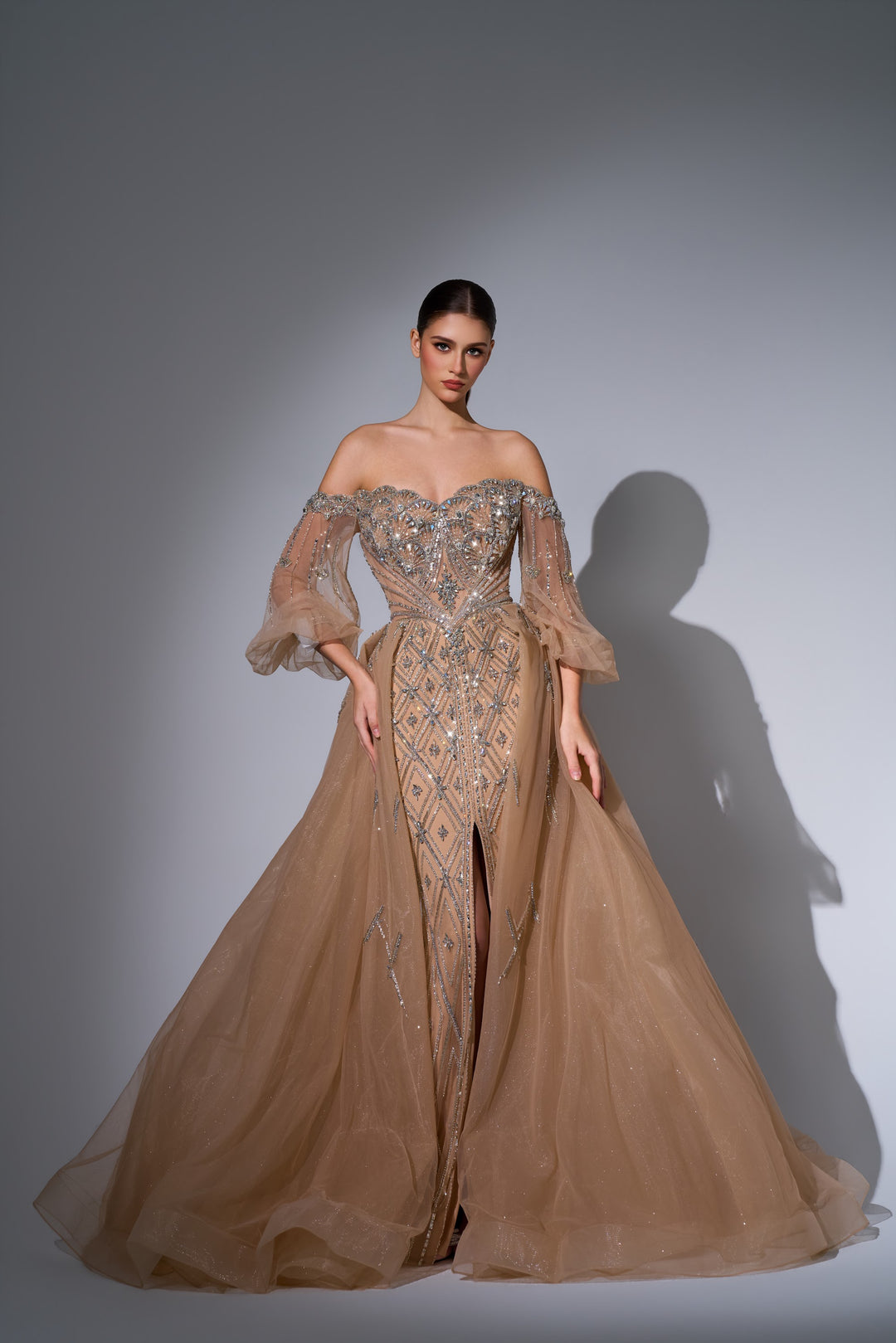 Delilah LD11622 Off-the-Shoulder Puff Sleeve Lattice Beaded Mermaid Gown with Tulle Overskirt - Champagne front view