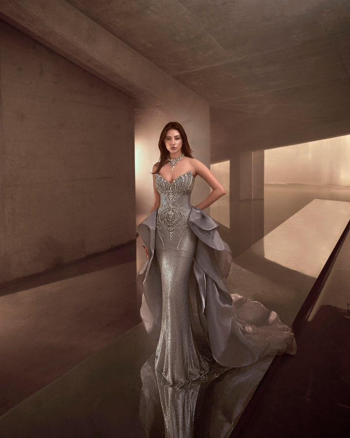 Delilah LD12102 Strapless Crystal Corset Mermaid Gown with Draped Satin Overskirt - Grey front view