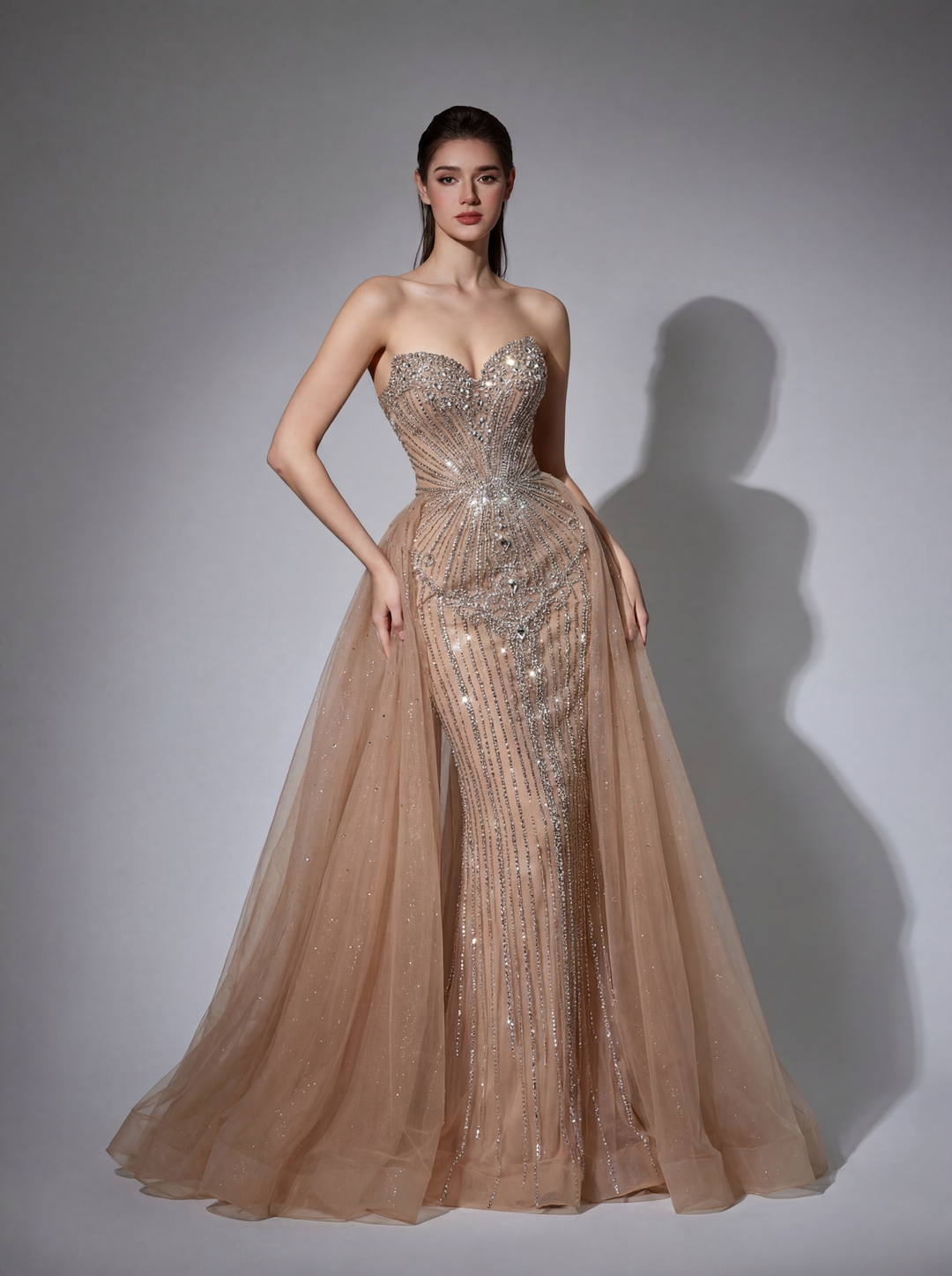 Delilah LD12047 Strapless Sweetheart Beaded Corset Sheath Gown with Bow Overskirt - Champagne front view