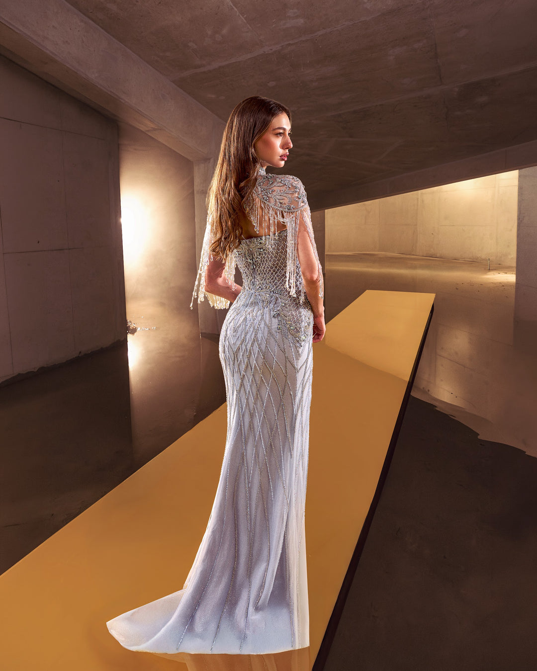 Delilah LD11692 High Neck Crystal Fringe Capelet Lattice Mermaid Gown - Blue back view