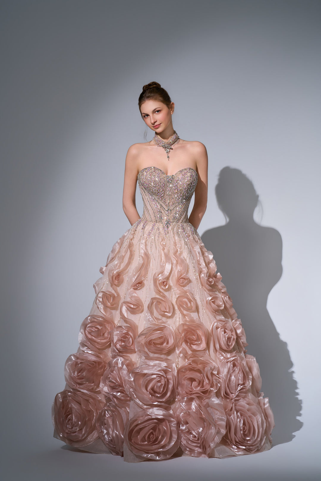 Delilah SH12068 Maxi Strapless Crystal Corset Ball Gown with 3D Rosette Skirt - Champagne front view