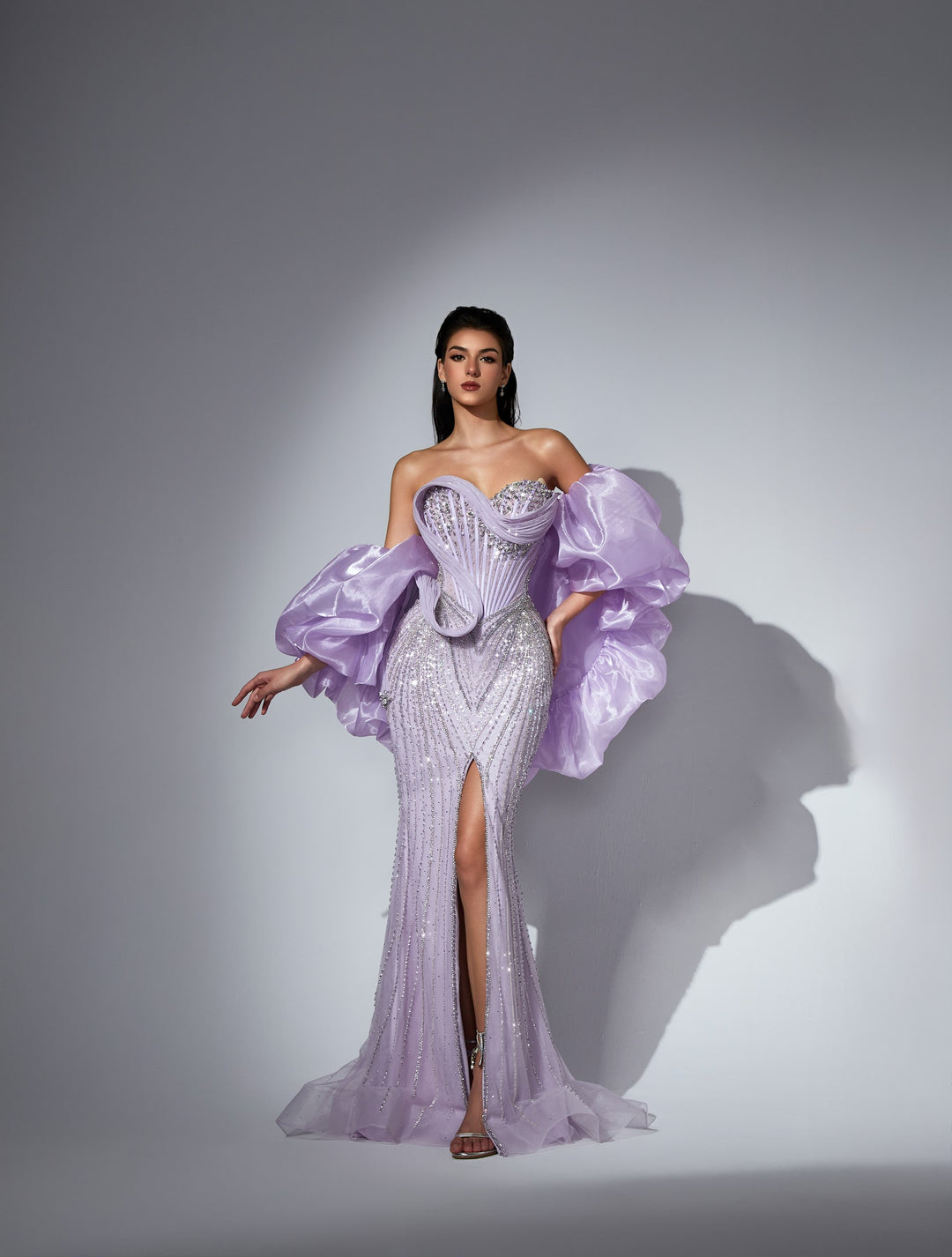 Delilah LD21161 Strapless Swirl Crystal Corset Mermaid Gown with Puff Sleeves and Slit - Lavender front view