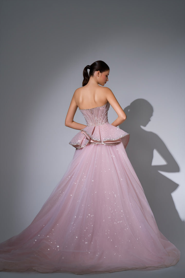 Delilah LD12089 Strapless Plunging Crystal Mermaid Gown with Peplum and Tulle Overskirt - Pink back view