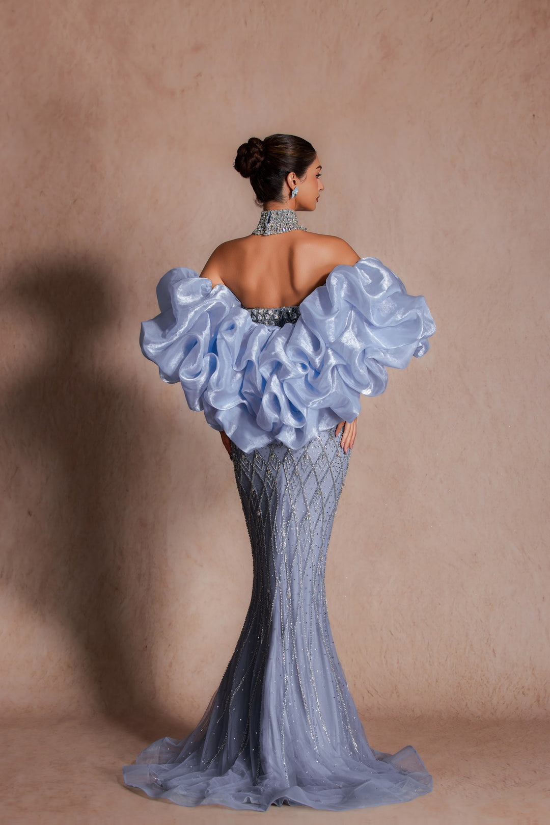 Delilah LD11689 Strapless Plunging Crystal Lattice Mermaid Gown with Puff Sleeves - Blue back view