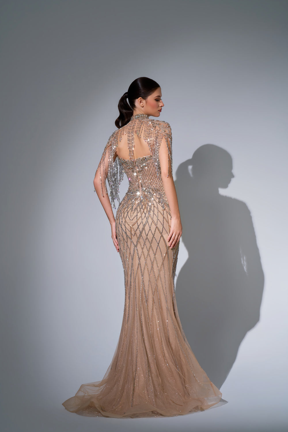 Delilah LD11692 High Neck Crystal Fringe Capelet Lattice Mermaid Gown - Champagne back view