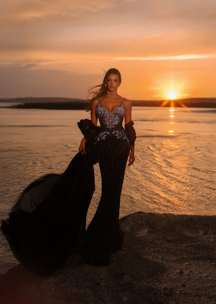 Delilah LD11585 Spaghetti Strap Crystal Corset Mermaid Gown with Ruffle Sleeves and Overskirt - Black front view