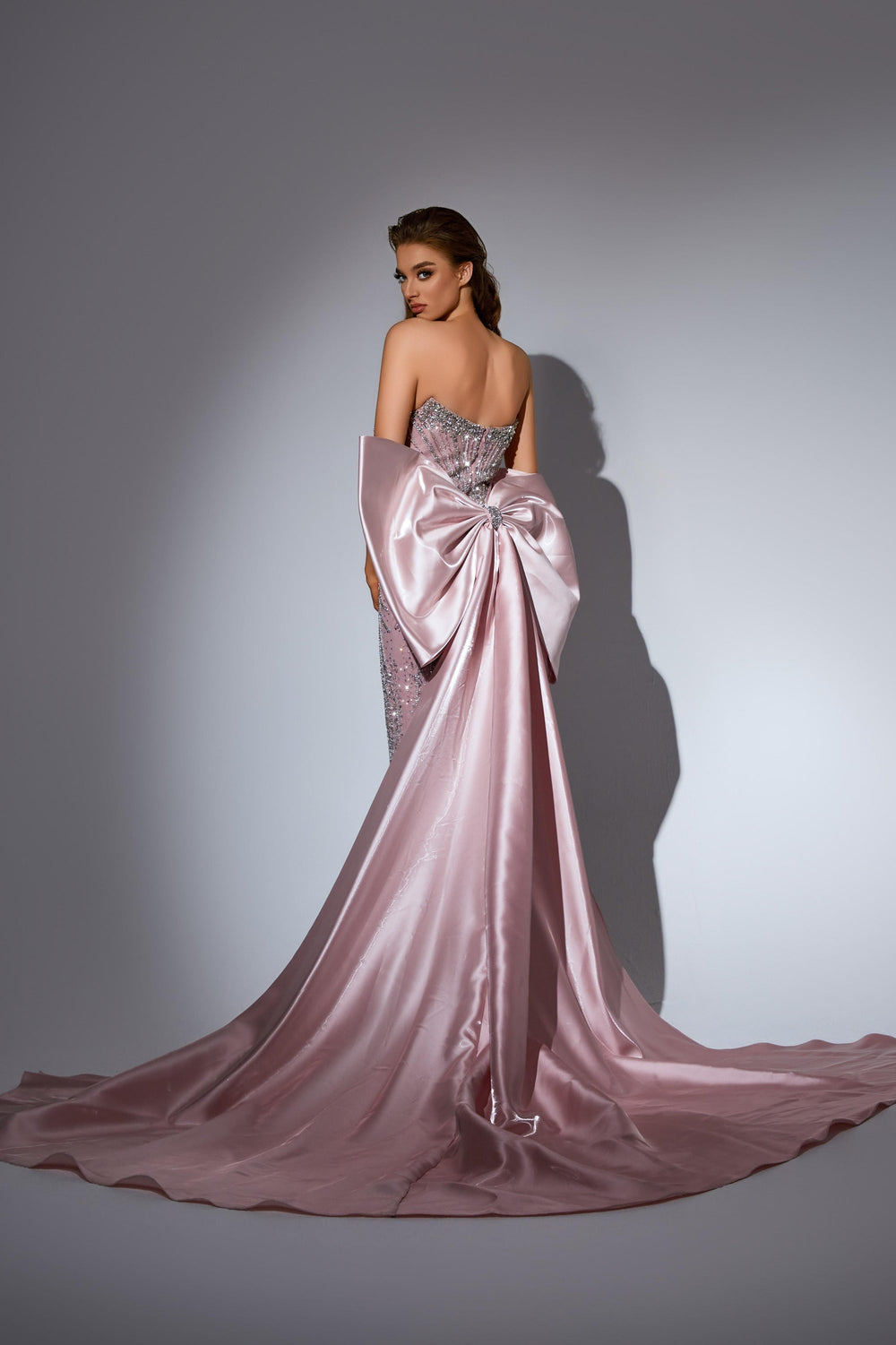 Delilah LD11486 Strapless Sweetheart Beaded Corset Sheath Gown with Oversized Back Bow Train - Pink back view