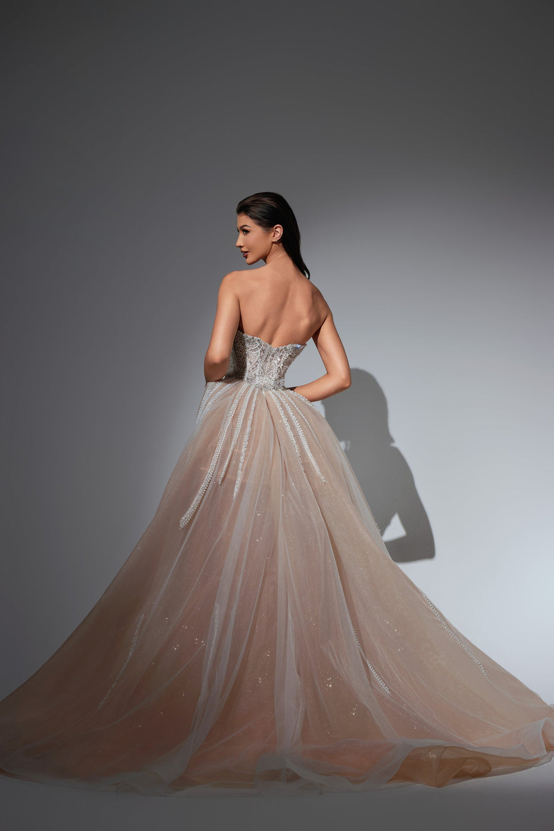 Delilah LD21131 Strapless Pearl and Crystal Corset Sheath Gown with Full Overskirt - White back view