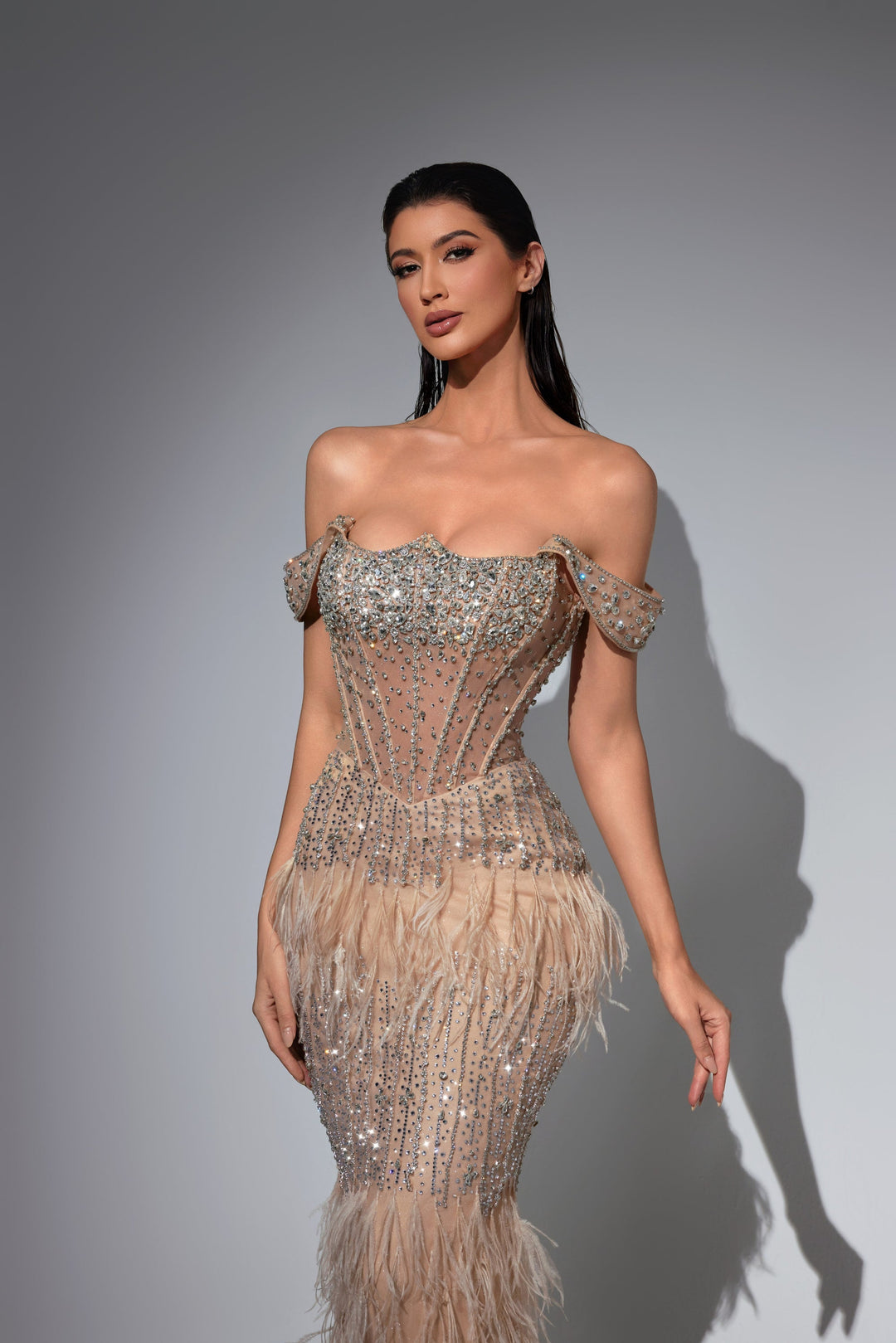 Delilah LD21098 Off-the-Shoulder Crystal Corset Sheath Gown with Feather Hip and Hem - Khaki close-up view