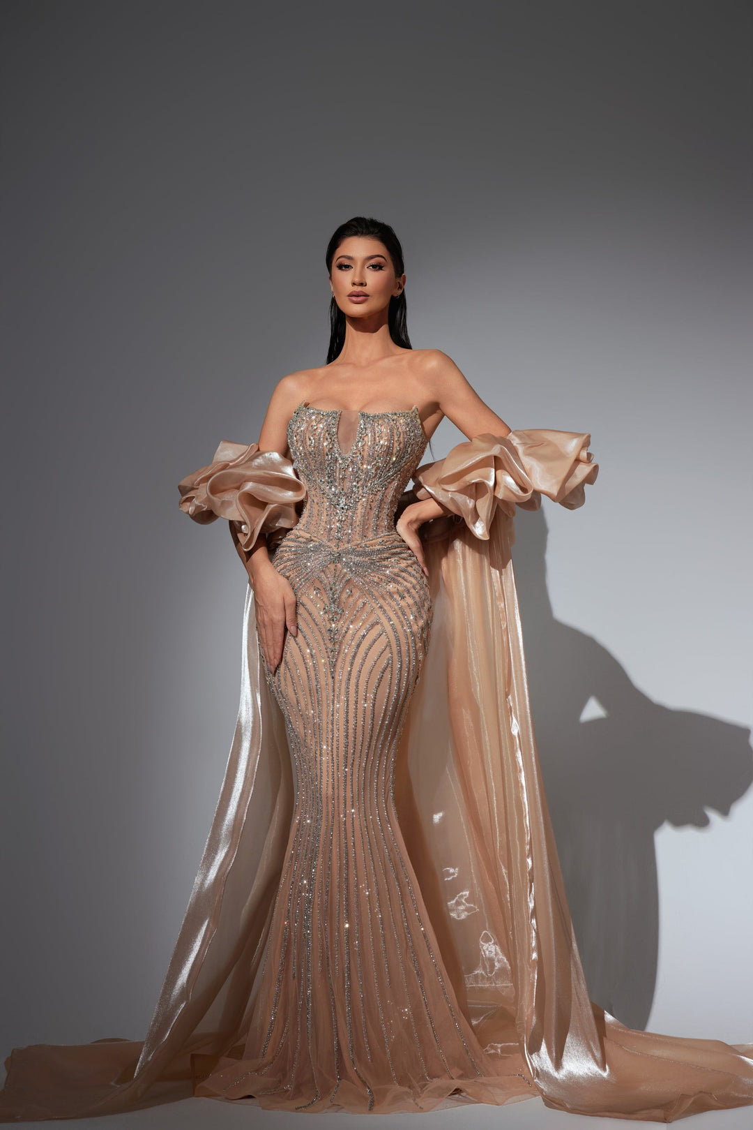 Delilah LD11441 Strapless Beaded Corset Mermaid Gown with Rosette Overskirt Train - Champagne front view