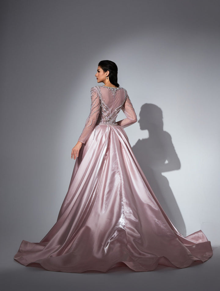 Delilah LD11475 Plunging Illusion Long Sleeve Beaded Corset Sheath Gown with Overskirt - Pink back view