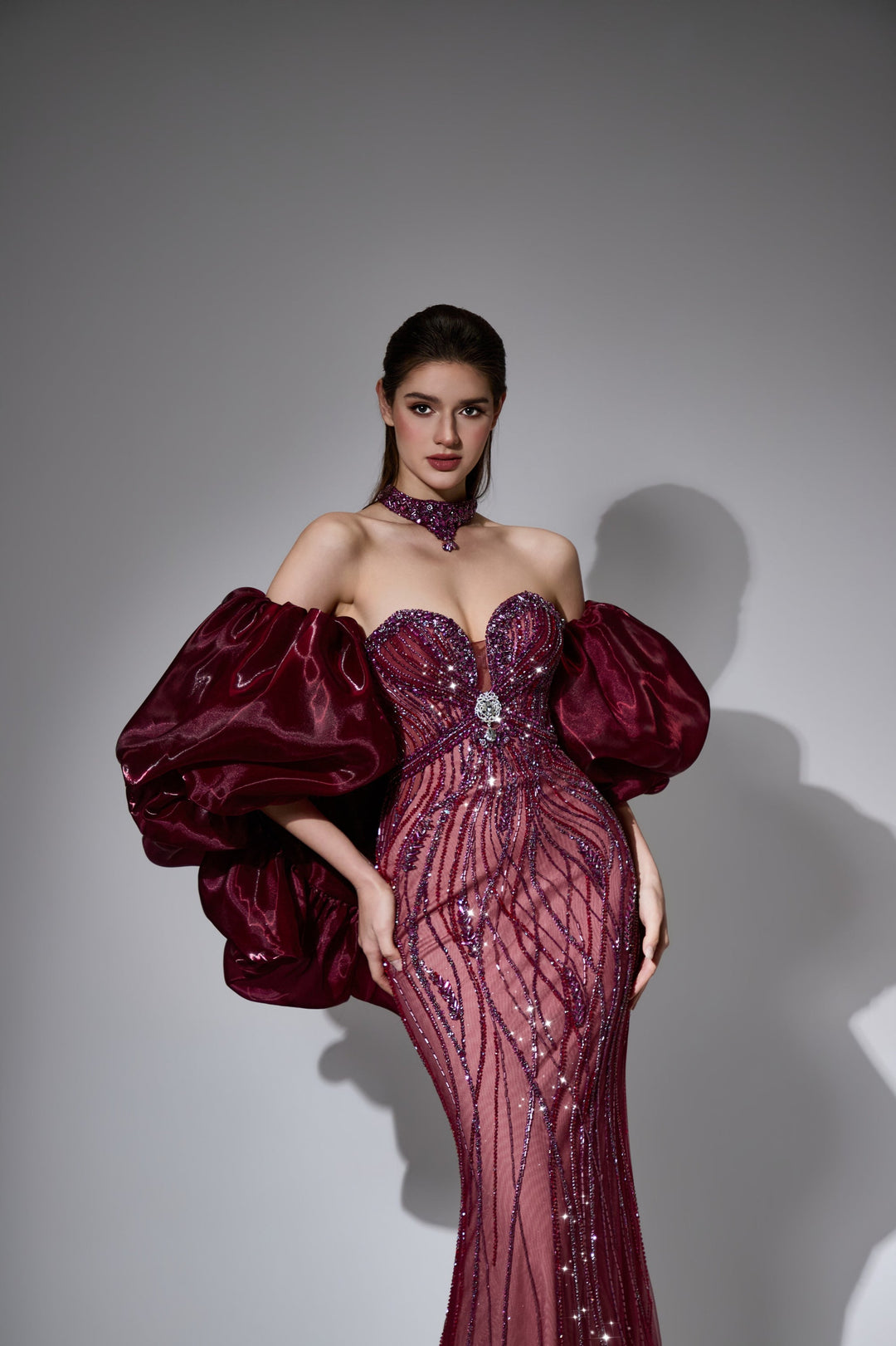 Delilah LD12056 Strapless Sweetheart Beaded Sheath Gown with Oversized Ruffled Arm Puffs - Red close-up view