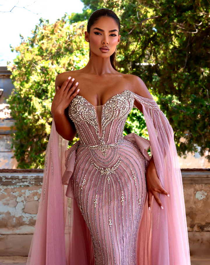 Delilah LD11214 Plunging Sweetheart Beaded Corset Mermaid Gown with Cape Sleeves and Overskirt - Pink close-up view