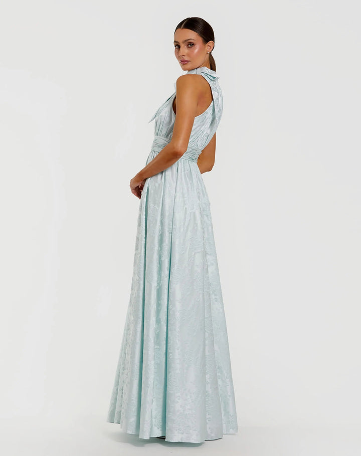 Blue Sleeveless Halter Neck Brocade Gown With Bow Detail - FOSTANI.com