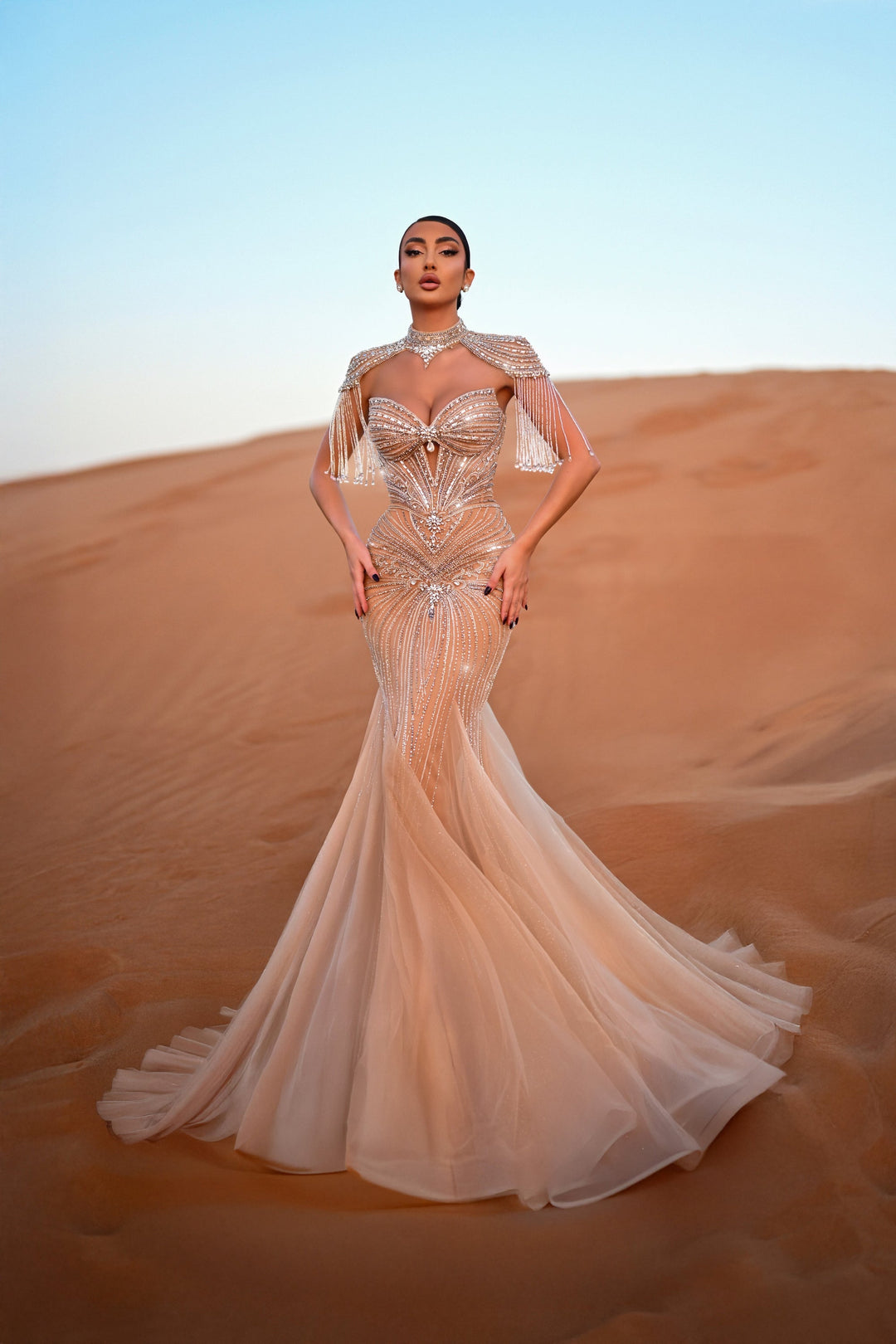 Delilah HM421 Beaded Mermaid Gown with Choker Collar, Crystal Fringe and Corset Bodice - Champagne front view
