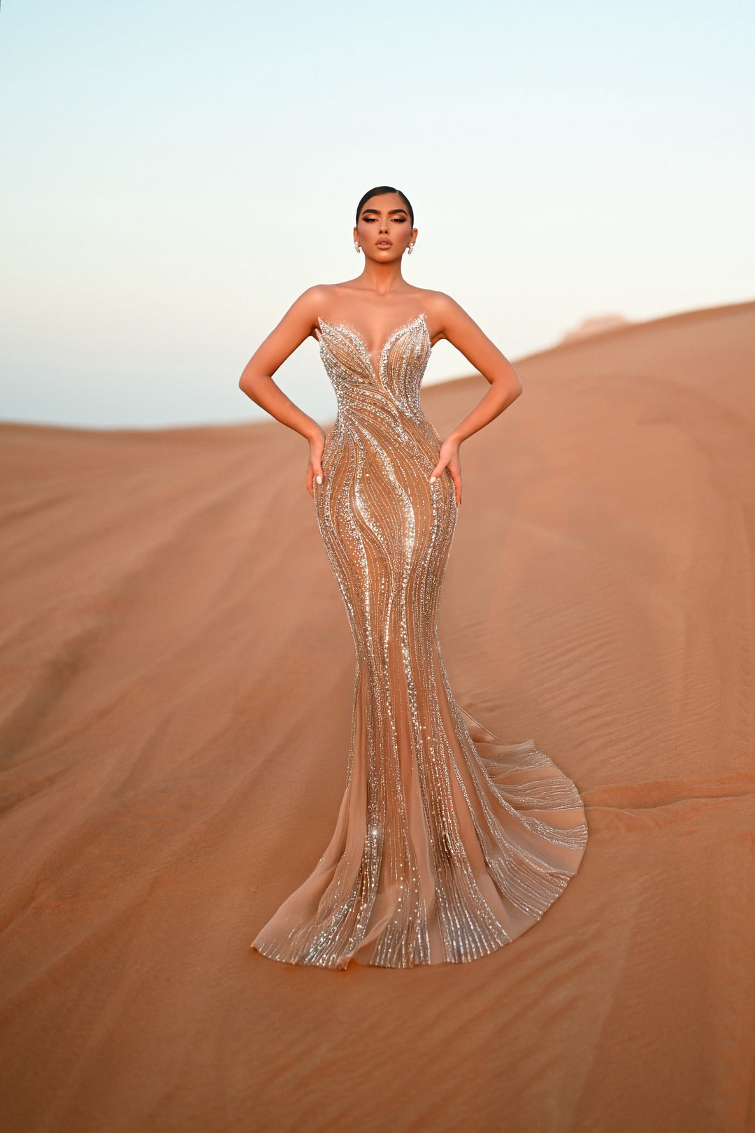 Delilah HM402 Strapless Plunging Sweetheart Beaded Mermaid Gown with Ruffled Overskirt - Champagne front view