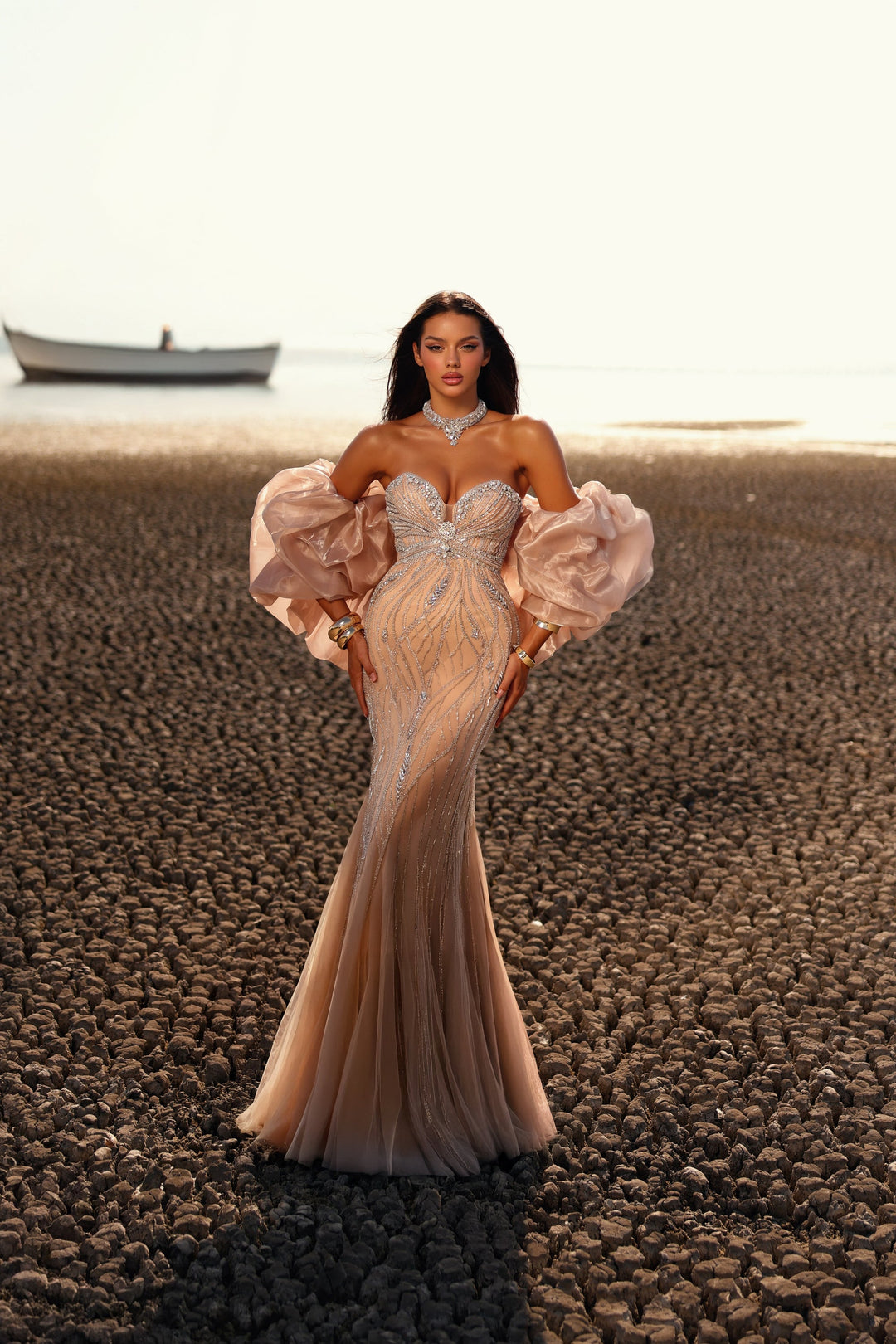 Delilah LD12056 Strapless Sweetheart Beaded Sheath Gown with Oversized Ruffled Arm Puffs - Champagne front view