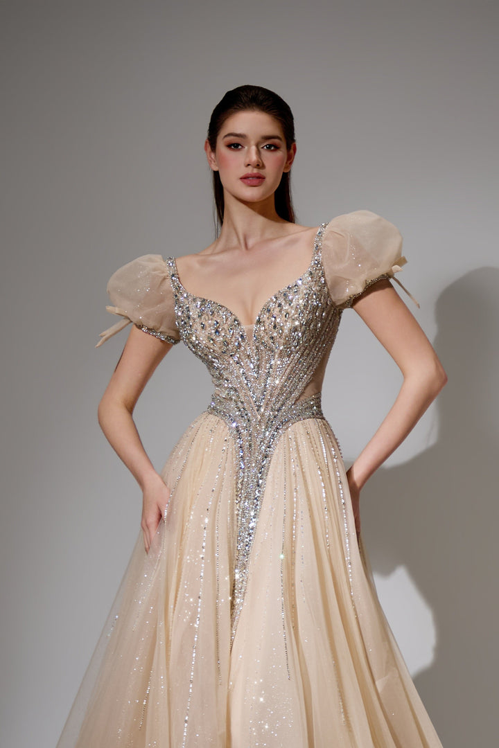 Delilah SH11608 Plunging Beaded Corset Ball Gown with Puff Sleeves - Champagne close-up view