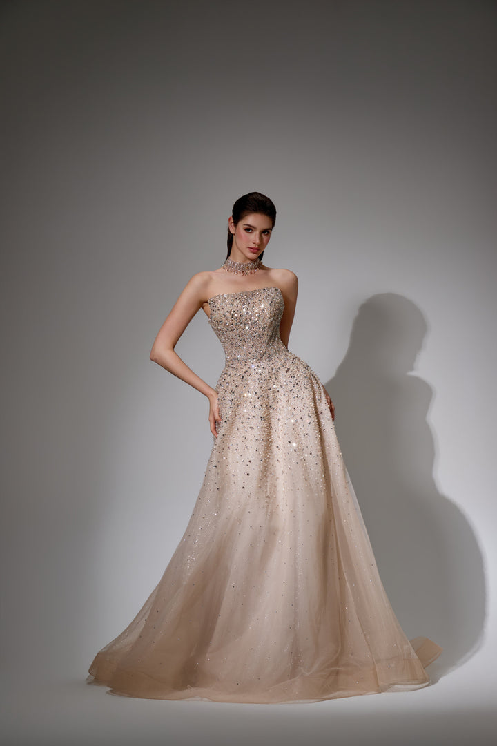 Delilah SH12020 Strapless Sequin Bodice A-Line Gown with Sparkle Skirt - Champagne front view