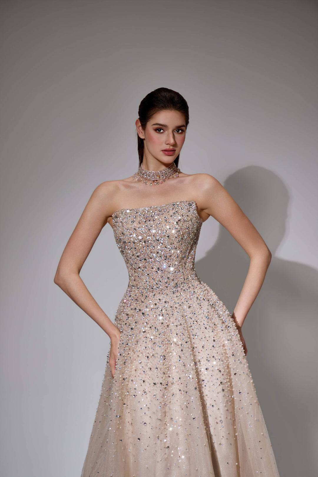 Delilah SH12020 Strapless Sequin Bodice A-Line Gown with Sparkle Skirt - Champagne close-up view