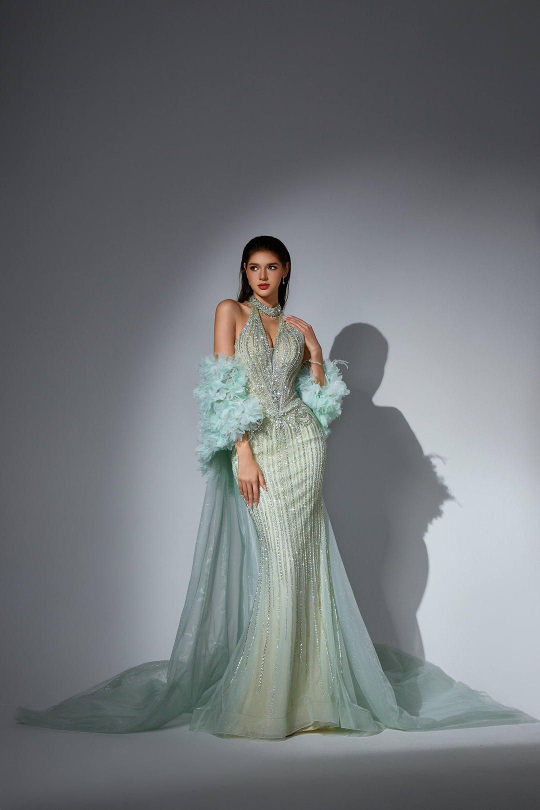 Delilah SH12045 Beaded Halter Plunging Mermaid Gown with Ruffled Arm Puffs and Overskirt - Mint front view