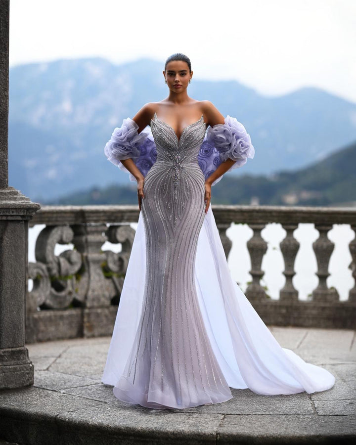 Delilah SH12052 Plunging Beaded Corset Mermaid Gown with Rosette Arm Puffs and Overskirt - Lavender front view