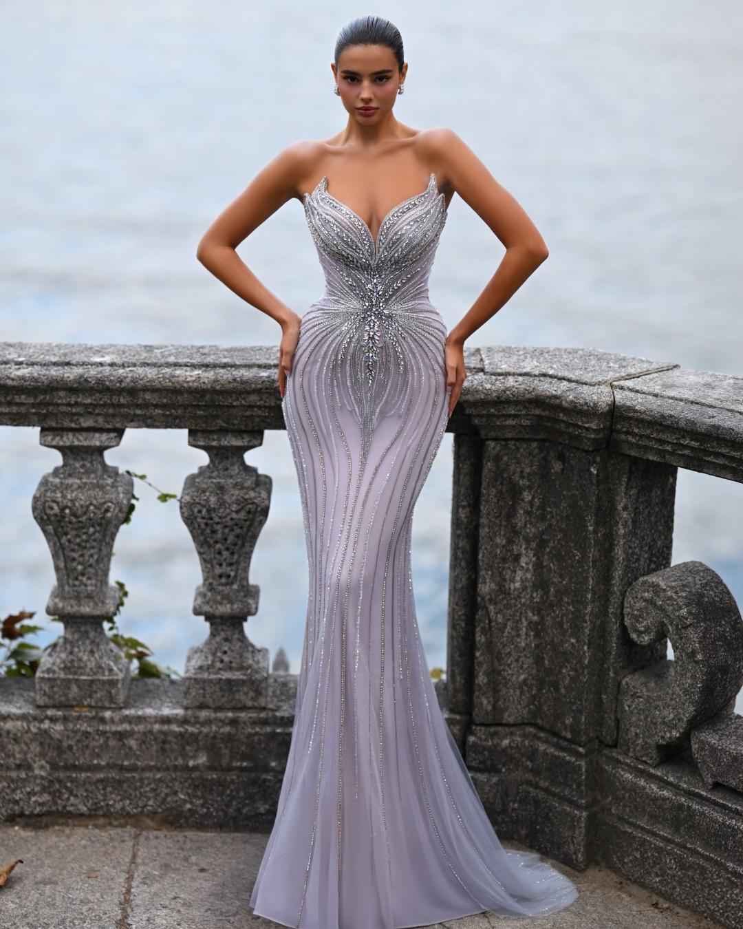 Delilah SH12052 Plunging Beaded Corset Mermaid Gown with Rosette Arm Puffs and Overskirt - Lavender front view
