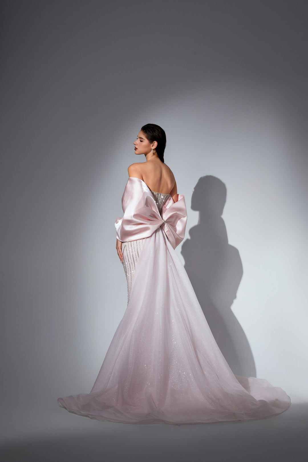 Delilah SH12053 Strapless Crystal Cup Corset Mermaid Gown with Statement Back Bow and Overskirt - Pink back view